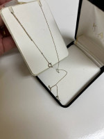 1 carat total weight diamond eternity necklace. 14K