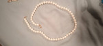 Two sets of pearl necklaces