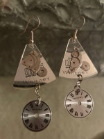 Pierced earrings made from clock parts