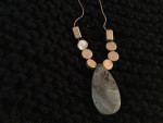 Elegant pendant on long chain