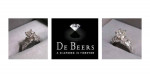 DIAMOND ENGAGEMENT RING IN PLATINUM SETTING W/SIDE BAGUETTES
