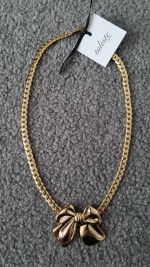 Gold Toned Tuleste Large Bow Necklace