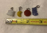 Four Miniature Charms