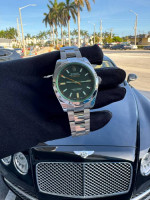 ROLEX Milgauss 116400GV Black dial Green crystal Box and Papers stainl