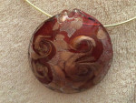 Glass pendant on goldtone necklace