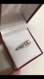 Beautiful diamond solitaire with accent diamonds. White gold setting