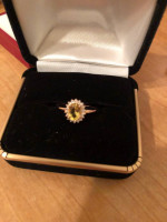 Natural canary sapphire and white sapphire halo ring. 14K rose platted