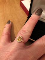 Natural canary sapphire and white sapphire halo ring. 14K rose platted