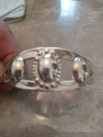 Sterling silver cuff bracelet .with a snake on each side