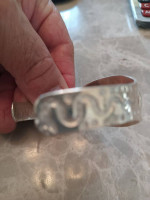 Sterling silver cuff bracelet .with a snake on each side