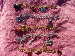 Brand New Charm Bracelets w/ 3 charms
