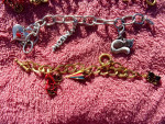 Brand New Charm Bracelets w/ 3 charms