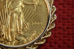 2003 50 DOLLAR GOLD EAGLE 1 OUNCE PURE GOLD IN 14K BEZEL