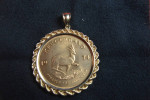 1 OUNCE .999 GOLD KRUGERRAND  IN 14K GOLD W/ROPE BEZEL EXQUISITE