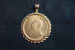 1 OUNCE .999 GOLD KRUGERRAND  IN 14K GOLD W/ROPE BEZEL EXQUISITE