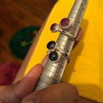Silver ring with stone ( ruby or sapphire )