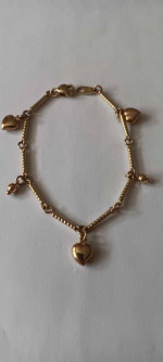 14k yellow Gold heart 7 inch bracelet = 7.28 grams