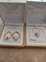 14k gold Swarovski necklace and earrings .set