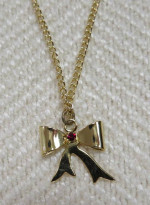 New, Gold Tone Necklace with Bow