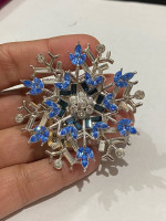Nolan Miller Blue and White snowflack brooch pin
