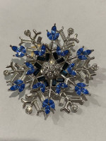 Nolan Miller Blue and White snowflack brooch pin