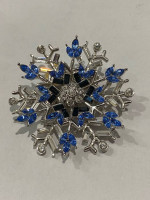 Nolan Miller Blue and White snowflack brooch pin