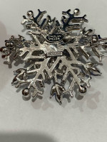 Nolan Miller Blue and White snowflack brooch pin