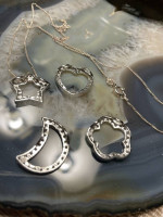 Sterling Silver Necklace With Charms