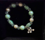 Beautiful handcrafted beaded bracelets w charms