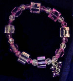 Beautiful handcrafted beaded bracelets w charms