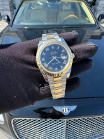 Rolex Datejust 41 41mm 116333 black Roman dial 18k yellow gold and sta
