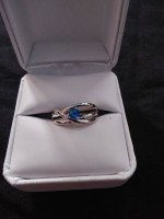 Silver ring with blue stone