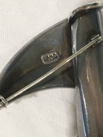Sterling silver pin by artist George Salo