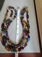 Triple strand necklace earth tone Beads of various sizes and shapes