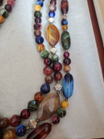 Triple strand necklace earth tone Beads of various sizes and shapes