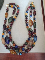 Triple strand necklace earth tone Beads of various sizes and shapes