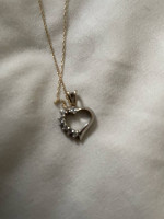 Gold heart charm necklace
