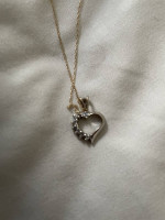 Gold heart charm necklace
