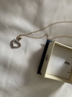 Gold heart charm necklace