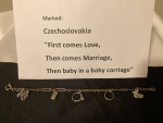 marked bracelet:  Czechoslovakia First Comes Love,Then comes Marriage,