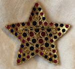 Signed Joan Rivers brooch, pink/red blue clear crystal star gold tone