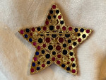 Signed Joan Rivers brooch, pink/red blue clear crystal star gold tone