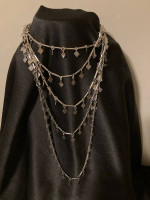 Lot of 2, 51" dangle necklaces & 1 pr earrings marked 1968 PAT. P