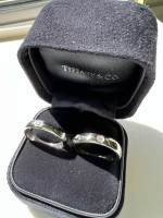 2 Tiffany platinum bands with diamond