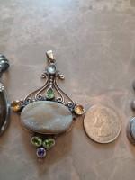 Large Sterling silver pendant.with stones