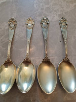 4 gold over sterling silver spoons . antique