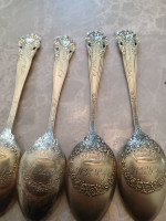 4 gold over sterling silver spoons . antique