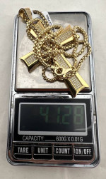 A beautiful necklace made of sterling silver and plated with gold. Cross pendant