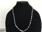 Long purple and white pearl necklace