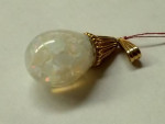 14k Yellow Gold Opal Globe 8x4 mm in size